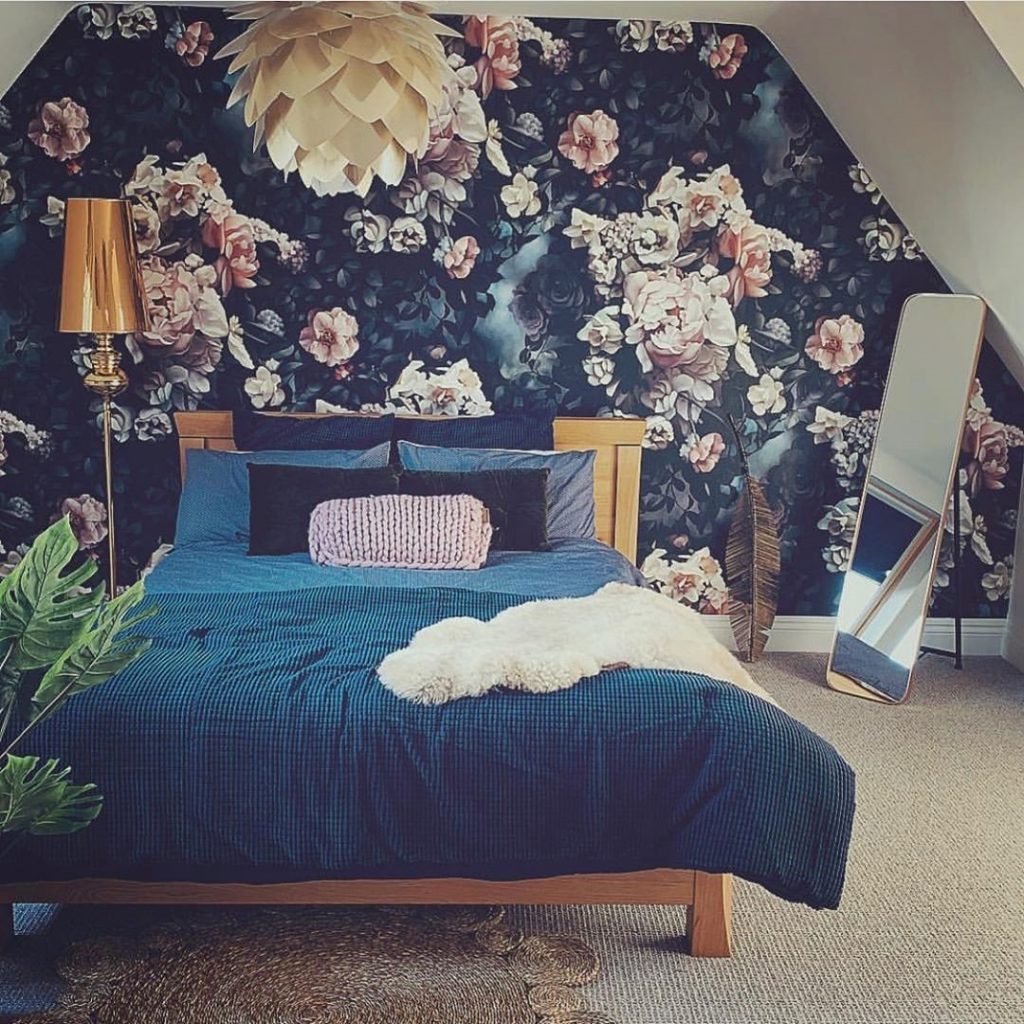 bedroom loft idea with floral wall paint